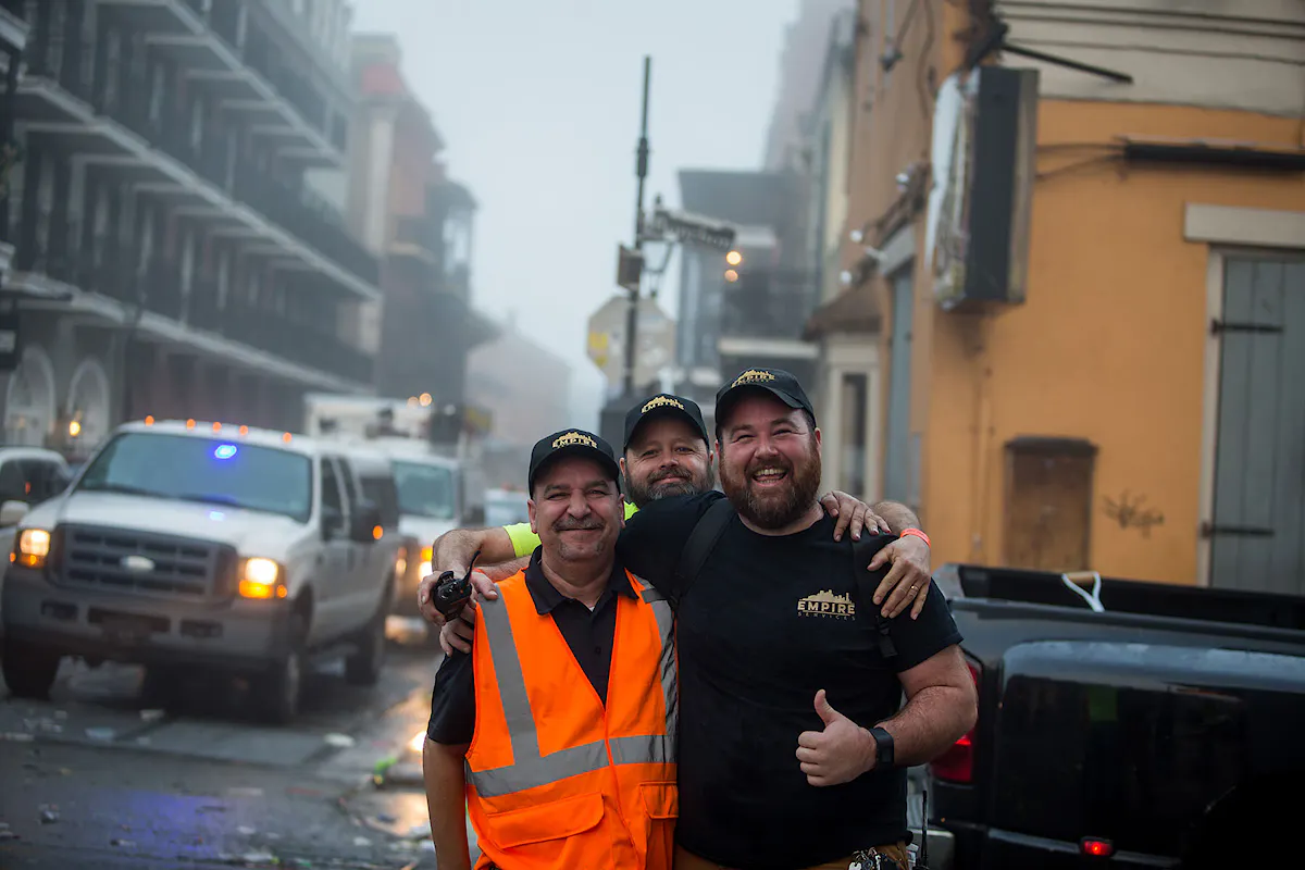 The KBS and Empire Services team celebrates a successful clean up operation at Mardi Gras