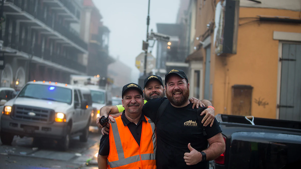 The KBS and Empire Services team celebrates a successful clean up operation at Mardi Gras