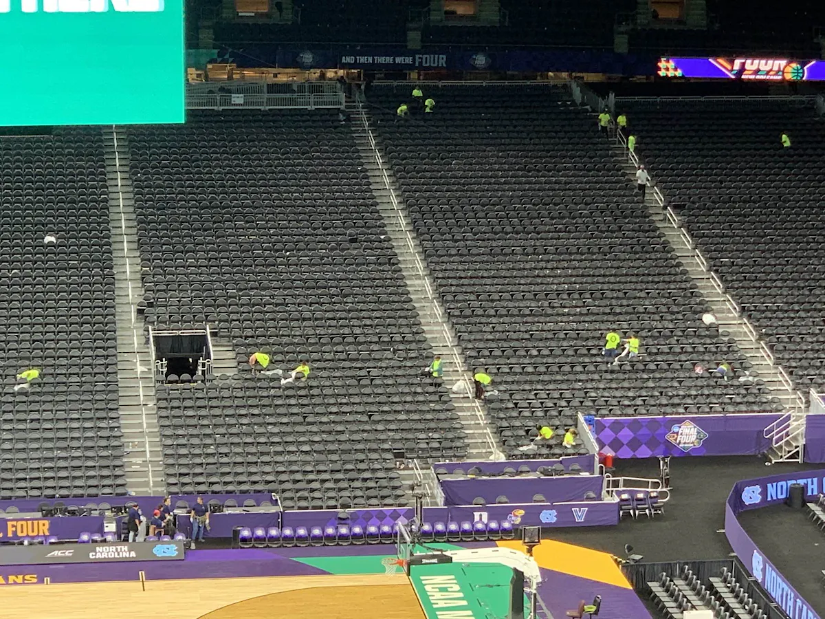 KBS crews assist with clean up in stadium at Final Four Weekend